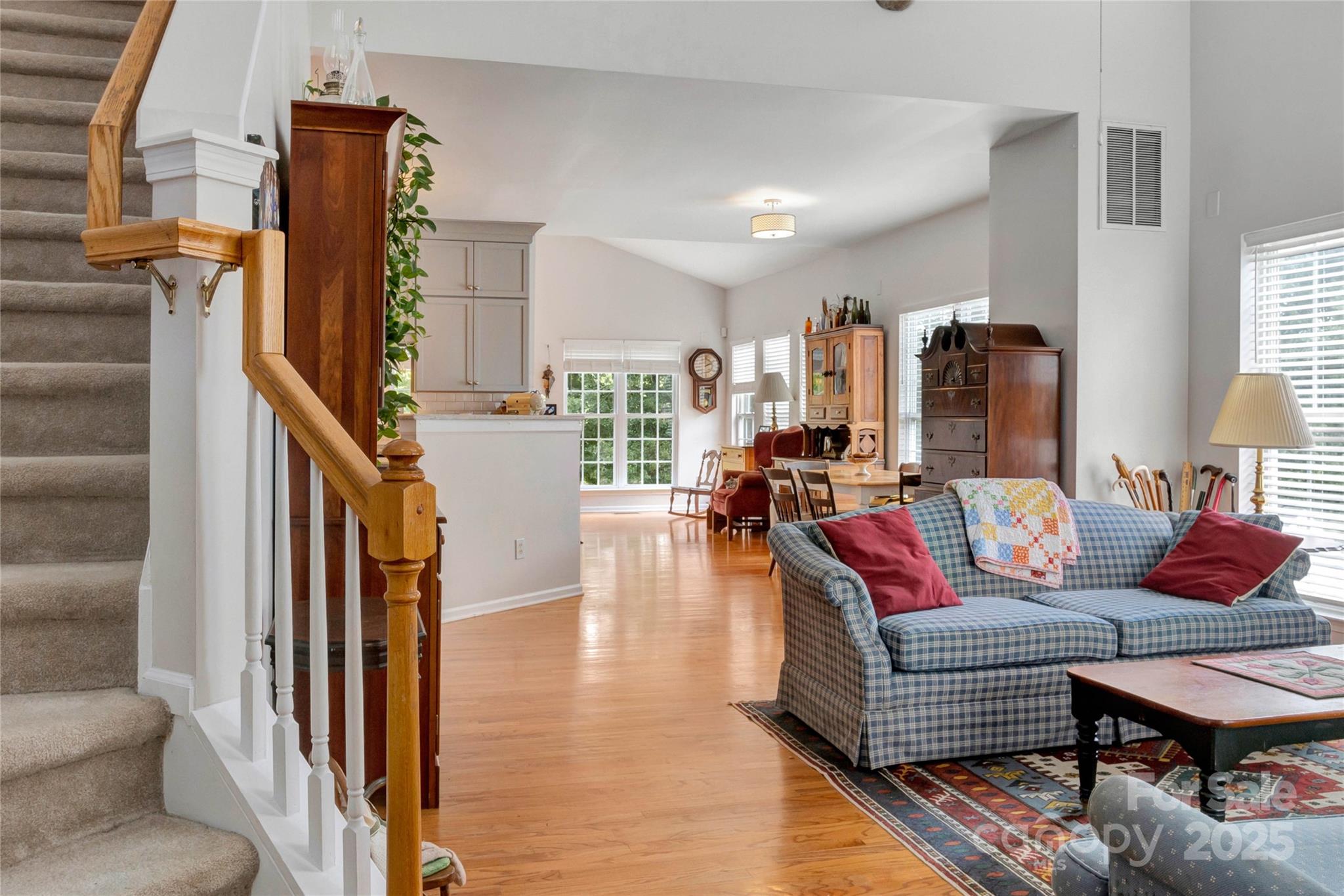 132 Lighthouse Road Mount Holly, NC 28120 - Photo 6 of 43 a living room with furniture and a wooden floor
