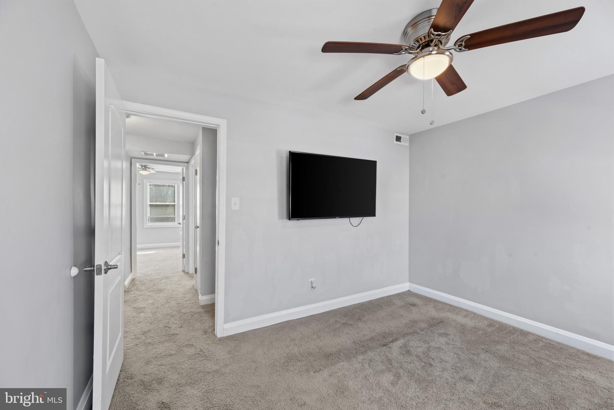353 Leeanne Road Essex, MD 21221 - Photo 11 of 29 a view of a livingroom with a flat screen tv