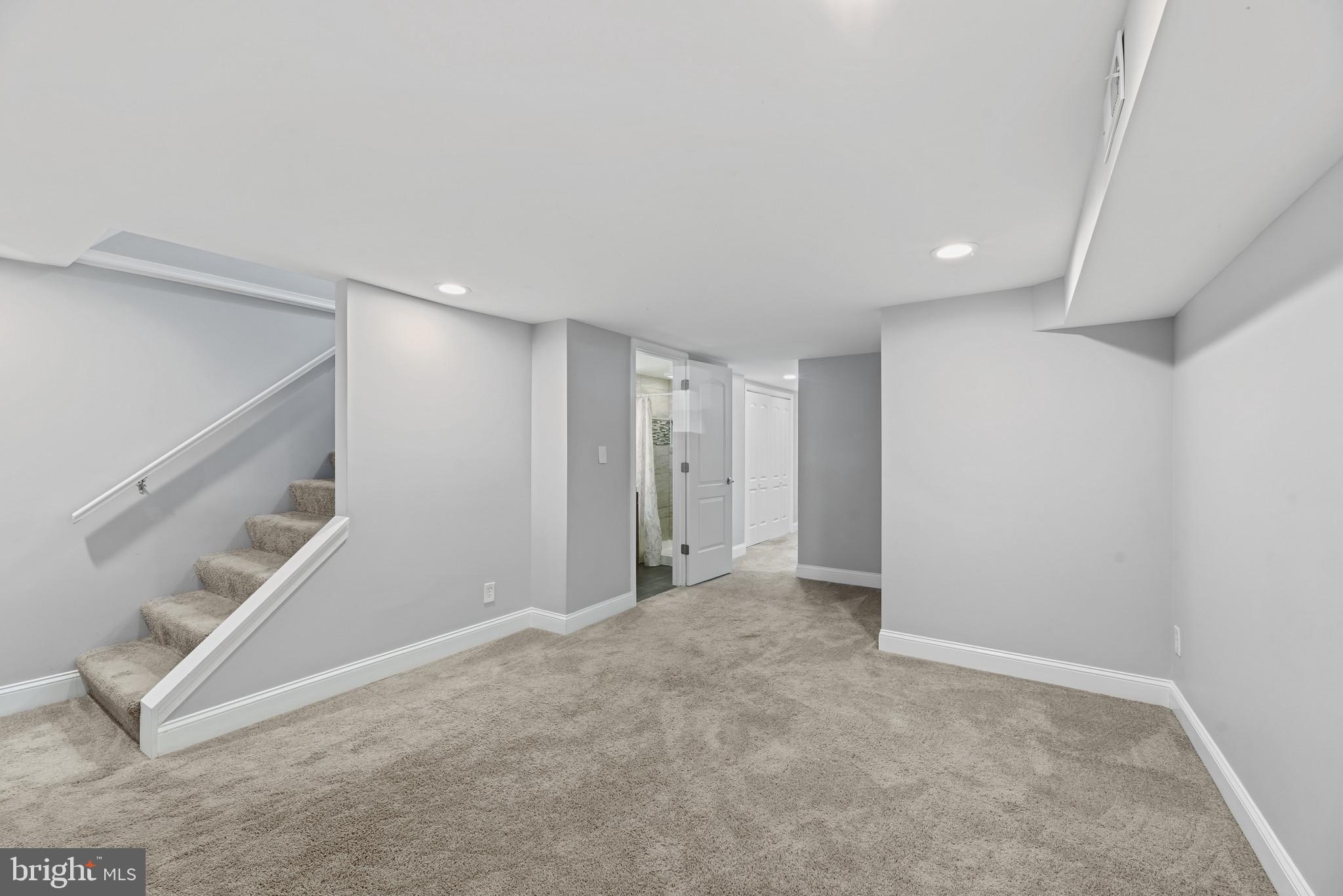 353 Leeanne Road Essex, MD 21221 - Photo 16 of 29 a view of an empty room with stairs