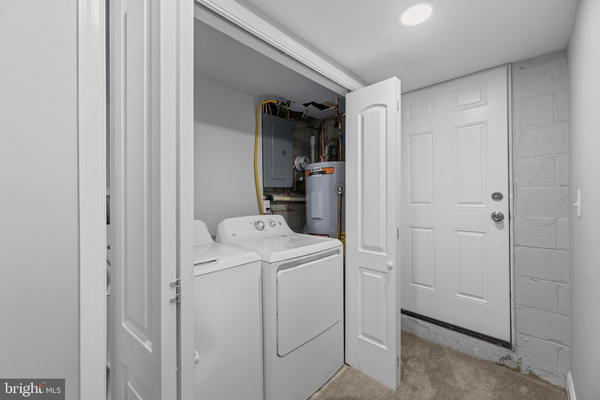 353 Leeanne Road Essex, MD 21221 - Photo 21 of 29 a view of storage and utility room with washer and dryer