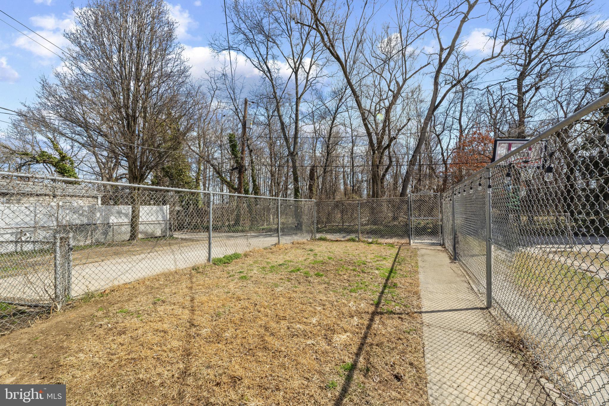 353 Leeanne Road Essex, MD 21221 - Photo 24 of 29 a view of yard and basketball court
