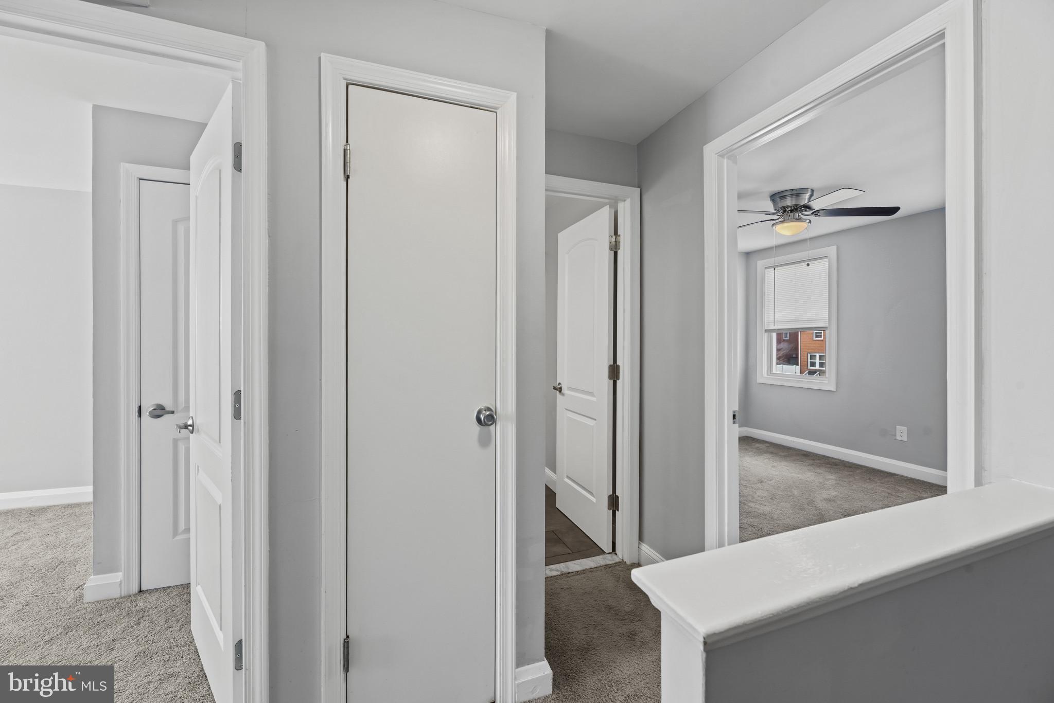 353 Leeanne Road Essex, MD 21221 - Photo 9 of 29 a view of a hallway with wooden floor and closet