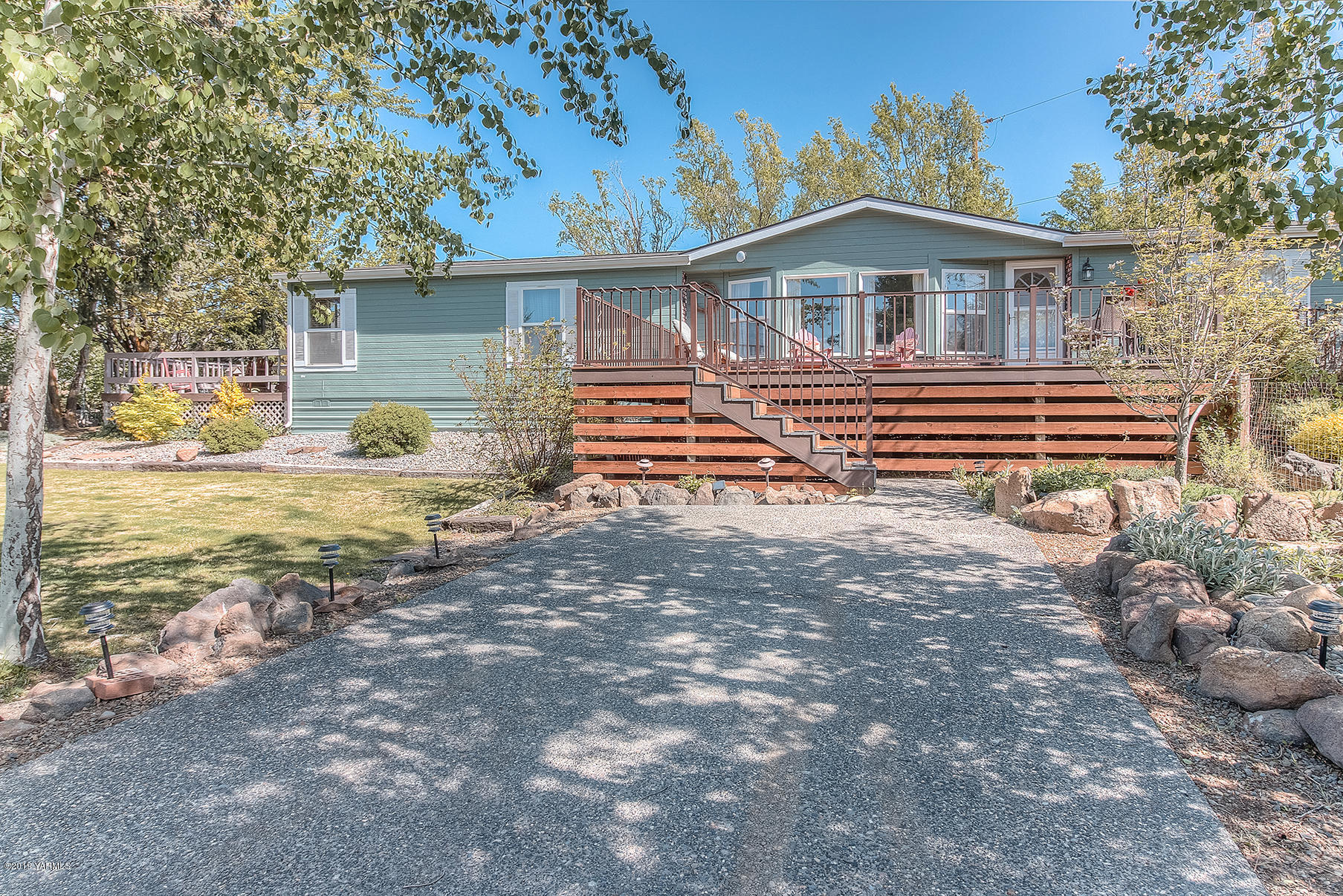 350 Schraeder Road Tieton, WA 98947 - Photo 1 of 39 a front view of a house with a yard