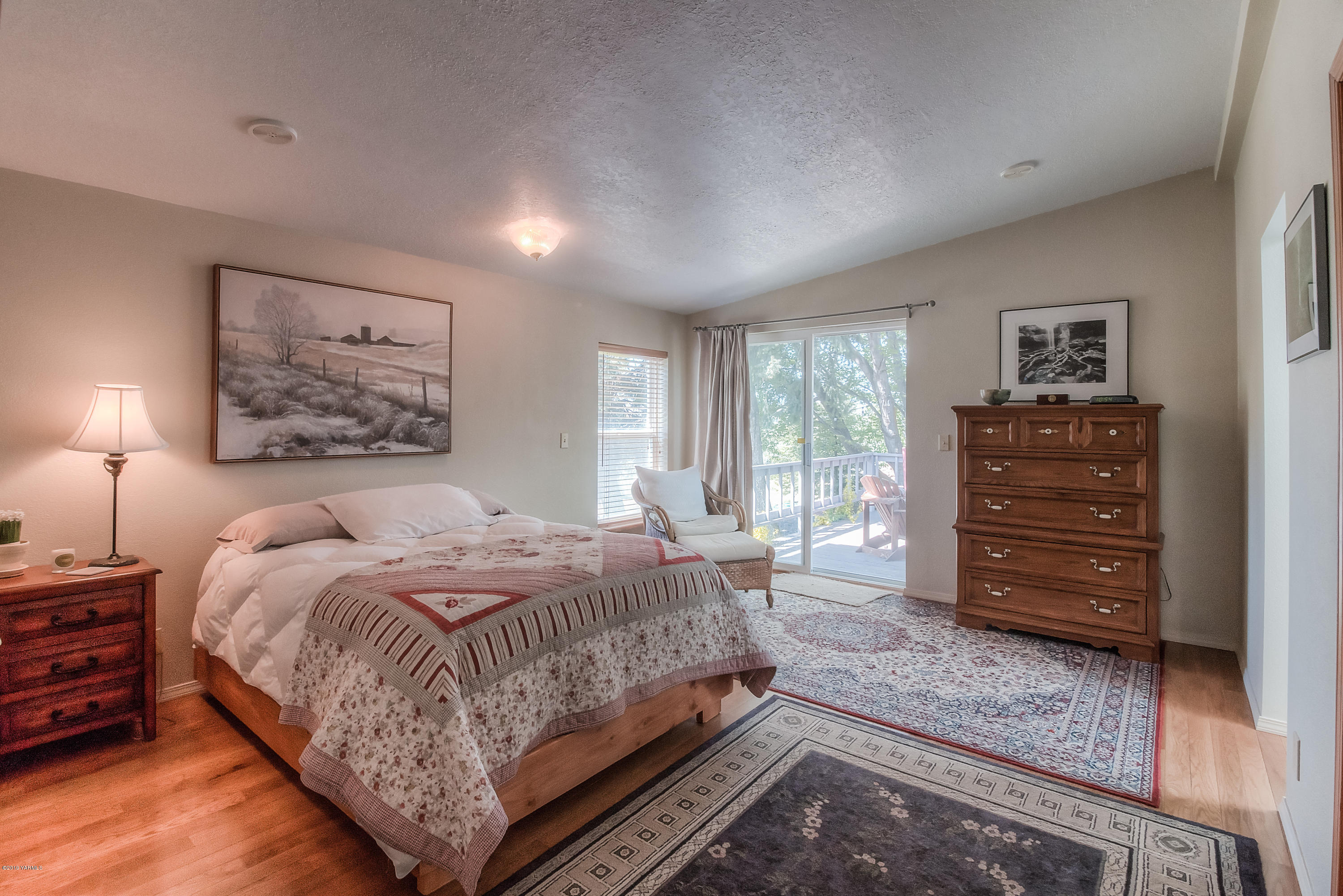 350 Schraeder Road Tieton, WA 98947 - Photo 16 of 39 a bedroom with a bed and dresser