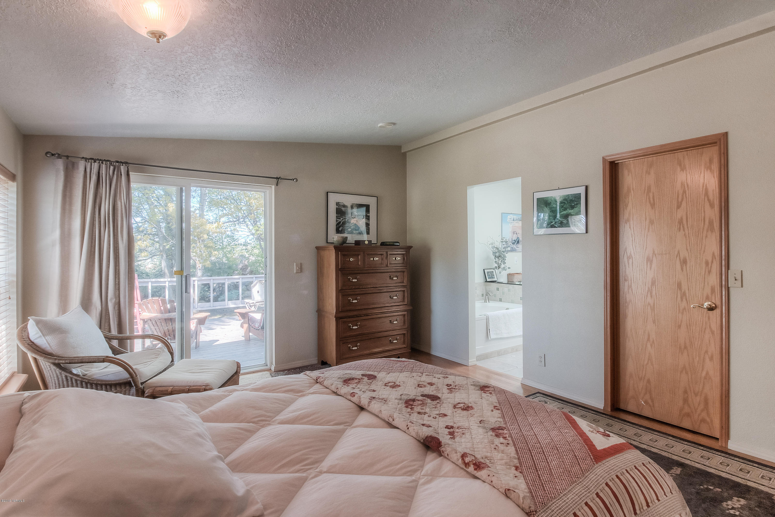350 Schraeder Road Tieton, WA 98947 - Photo 17 of 39 a bedroom with a bed dresser and a window