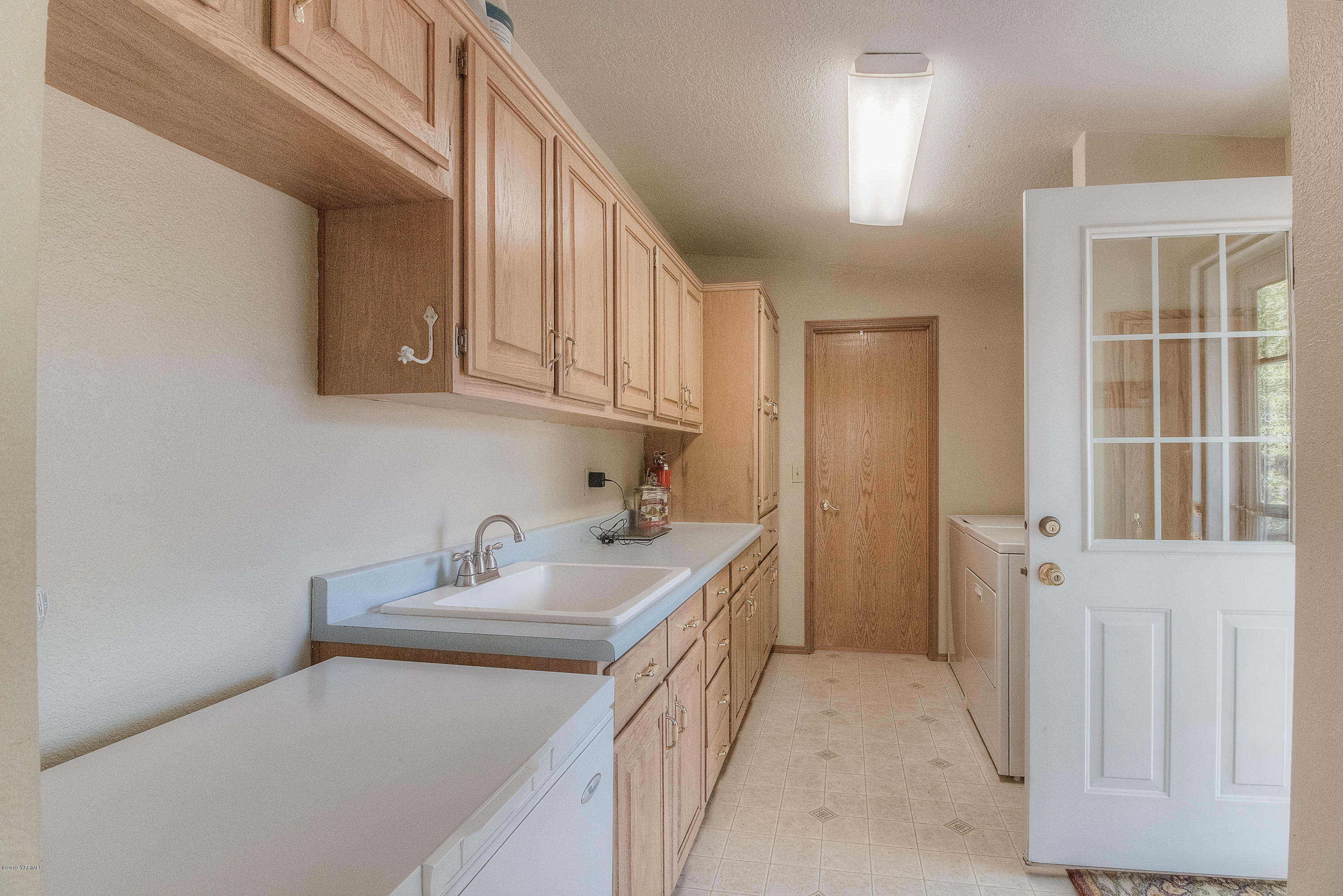 350 Schraeder Road Tieton, WA 98947 - Photo 28 of 39 a kitchen with a sink and cabinets