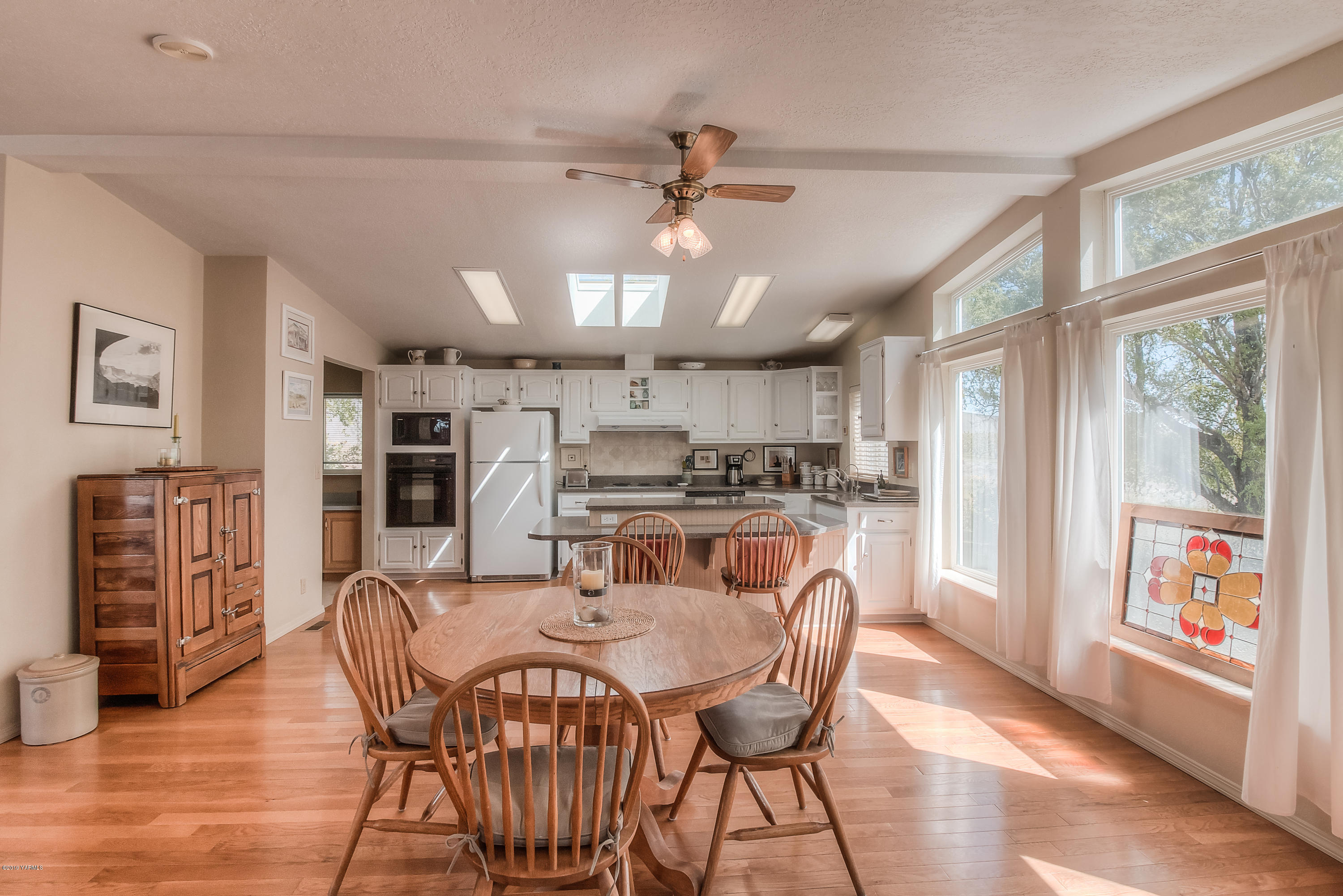 350 Schraeder Road Tieton, WA 98947 - Photo 9 of 39 a view of a dining room with furniture window and wooden floor