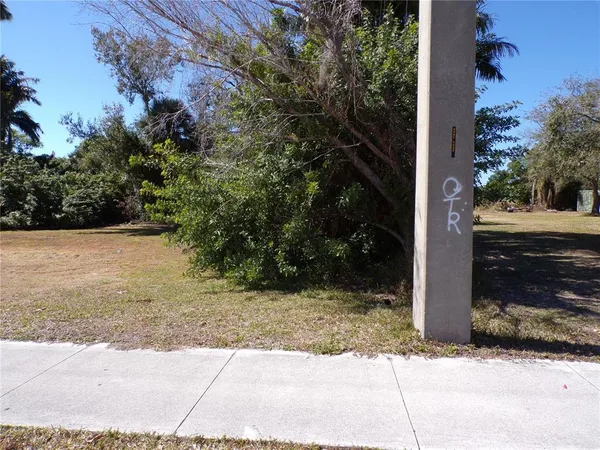 a view of ocean with a yard