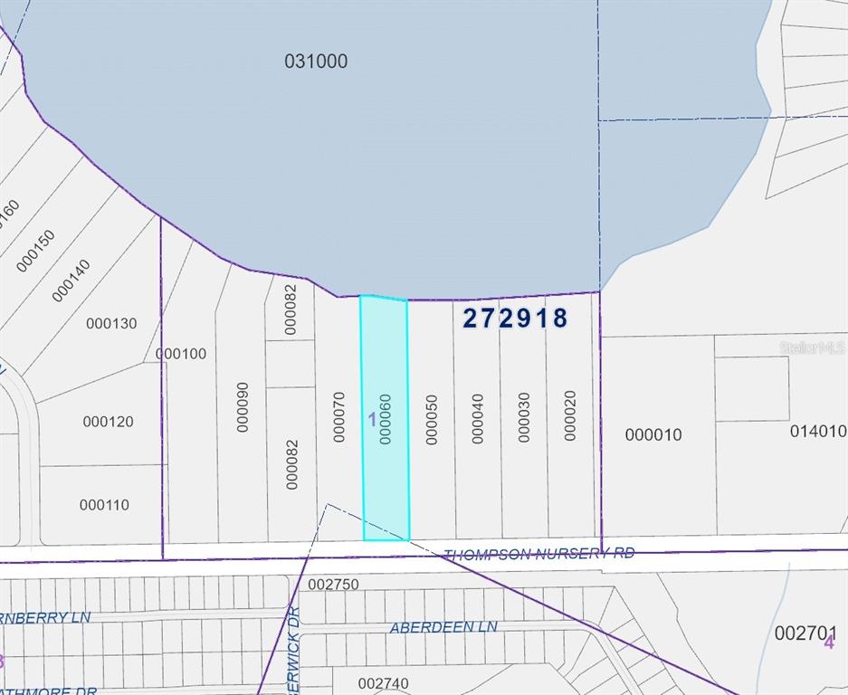 7820 Thompson Nursery Road Winter Haven, FL 33884 - Photo 7 of 7 a view of a entryway with wooden floor