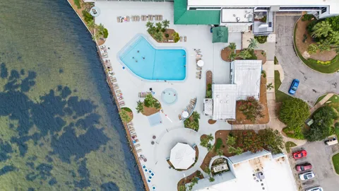 a living room with furniture and a lamp