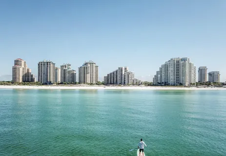 a street view of a building with street view and trees