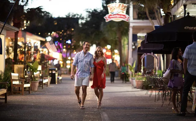 a view of road with shops