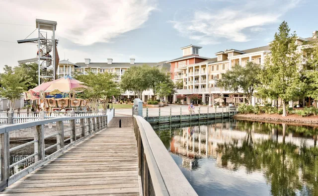 a front view of a building with sitting area