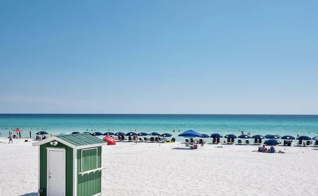 a view of a lake with houses with outdoor space