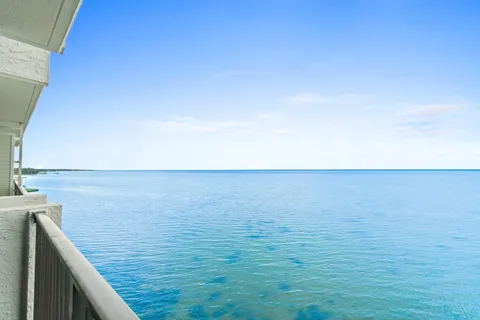a view of an ocean from a balcony