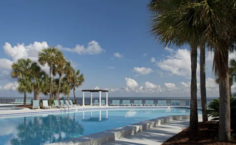 a view of a lake with a house