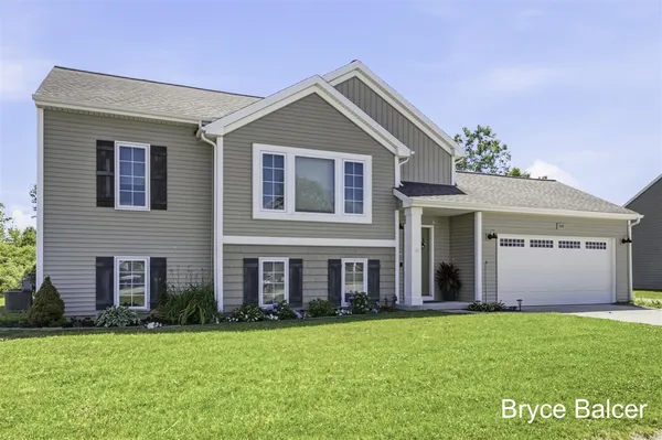 $365,000 | 338 Vansen Drive, Kent City, MI 49330