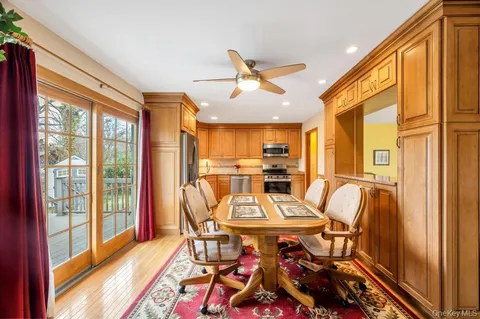 a view of a dining room with furniture window and outside view