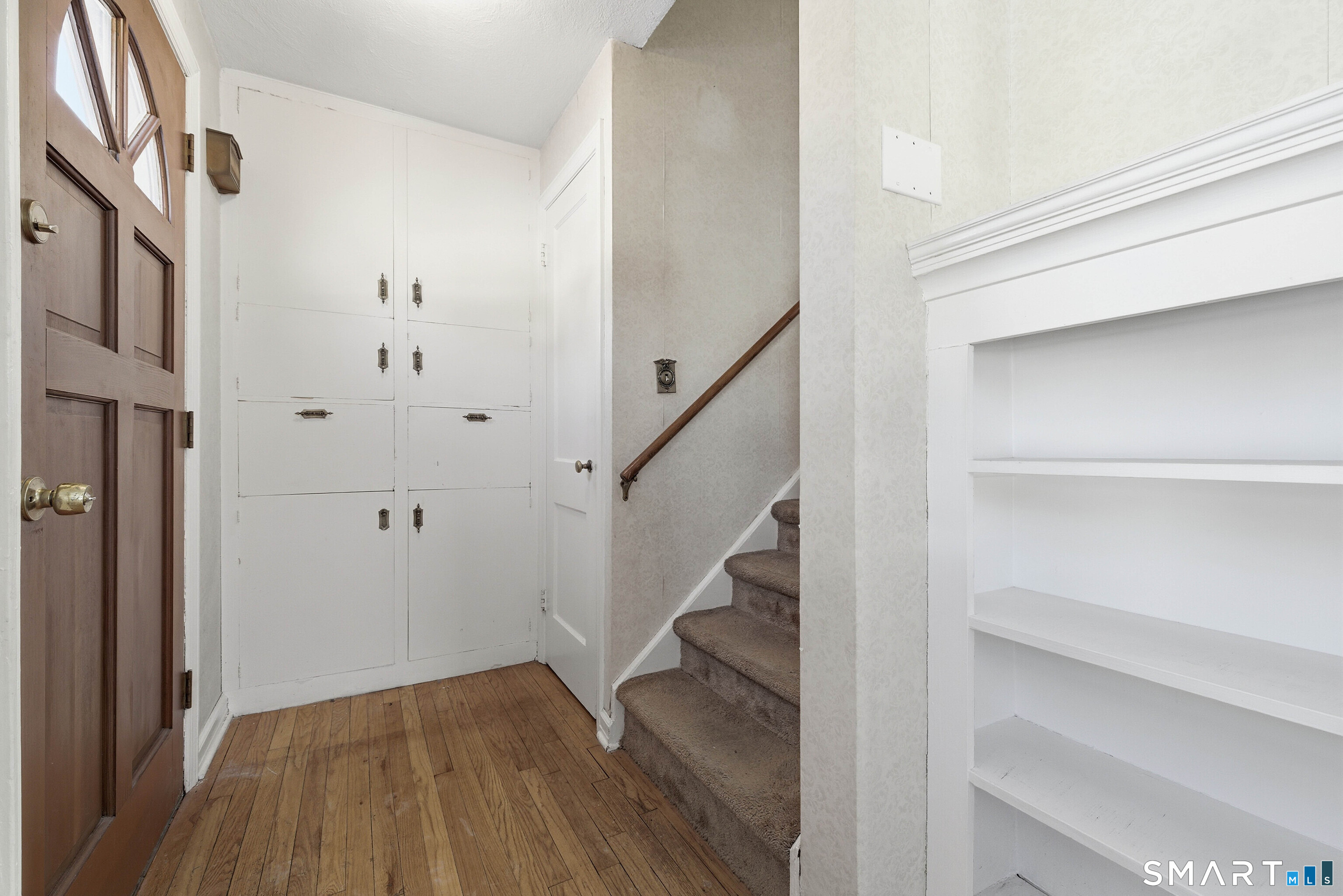 15 Townline Road Hamden, CT 06517 - Photo 20 of 38 Front entrance with stairway to second floor with storage