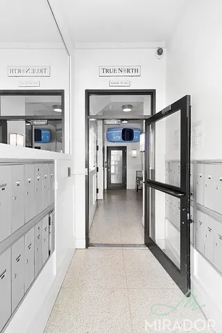 a view of a kitchen from an empty room