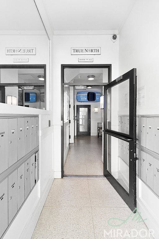 65 4th Avenue, Unit 6C Manhattan, NY 10003 - Photo 10 of 11 a view of hallway with chandelier