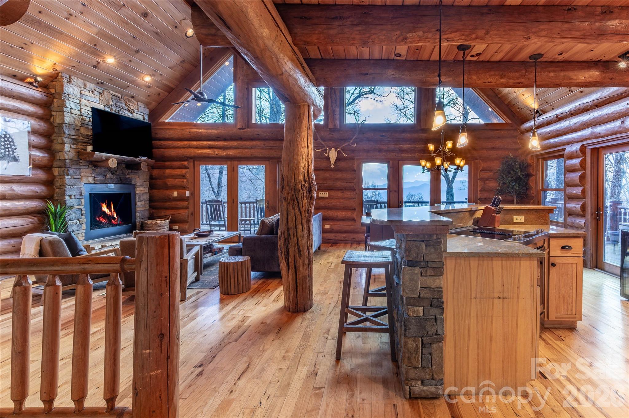 1391 Still Branch Road Sylva, NC 28779 - Photo 12 of 40 a view of a chairs and table in a patio