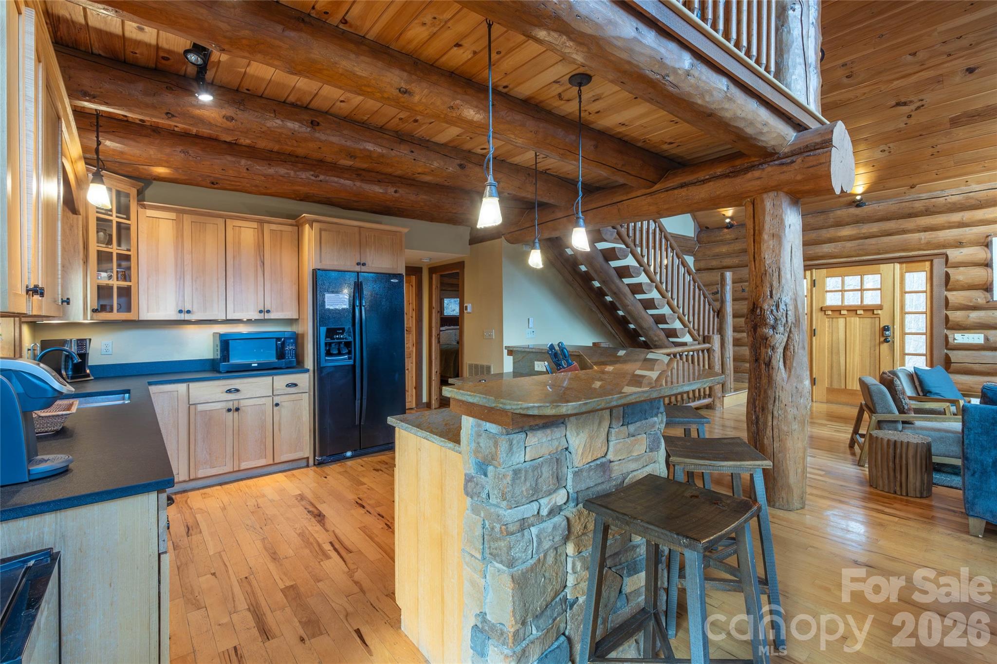 1391 Still Branch Road Sylva, NC 28779 - Photo 16 of 40 a kitchen with stove and cabinets