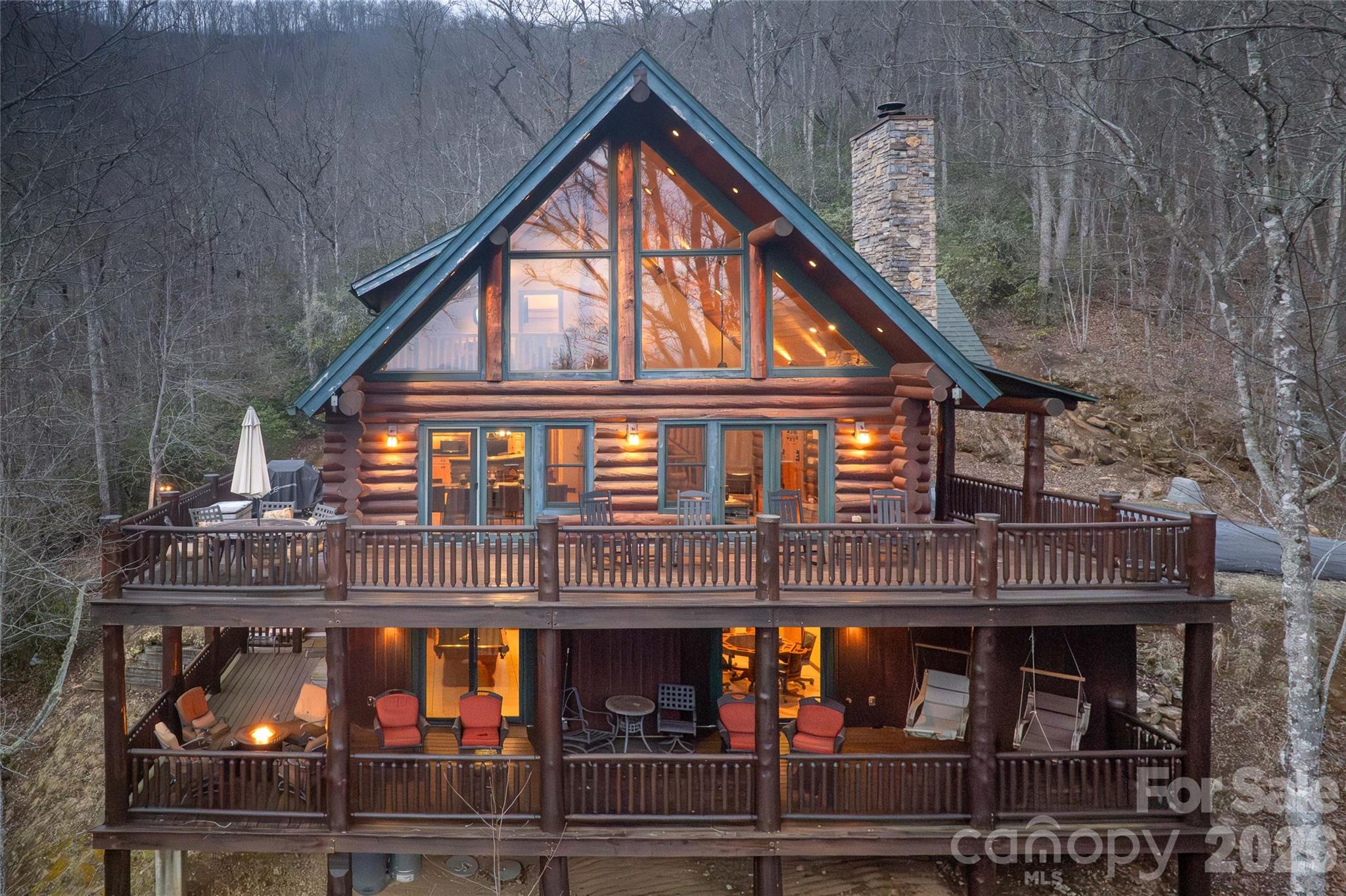 1391 Still Branch Road Sylva, NC 28779 - Photo 2 of 40 a front view of a house with tub and glass windows