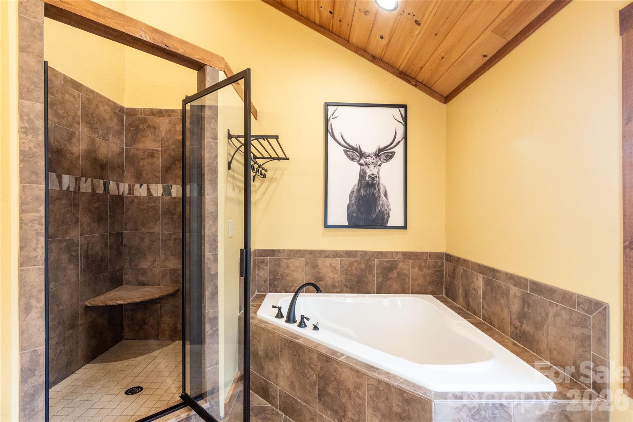 1391 Still Branch Road Sylva, NC 28779 - Photo 24 of 40 a bathroom with a tub and shower