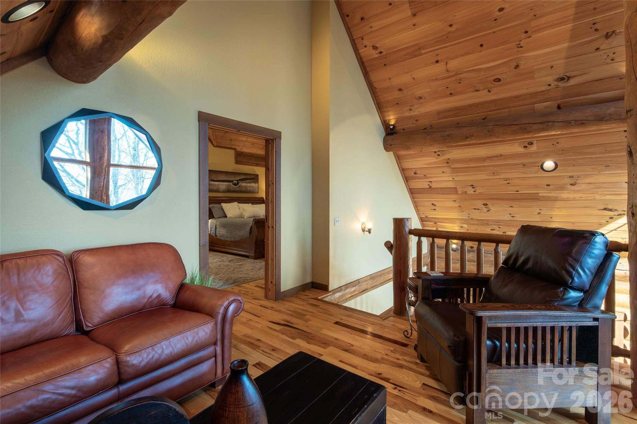 1391 Still Branch Road Sylva, NC 28779 - Photo 25 of 40 a view of a livingroom with furniture and a staircase