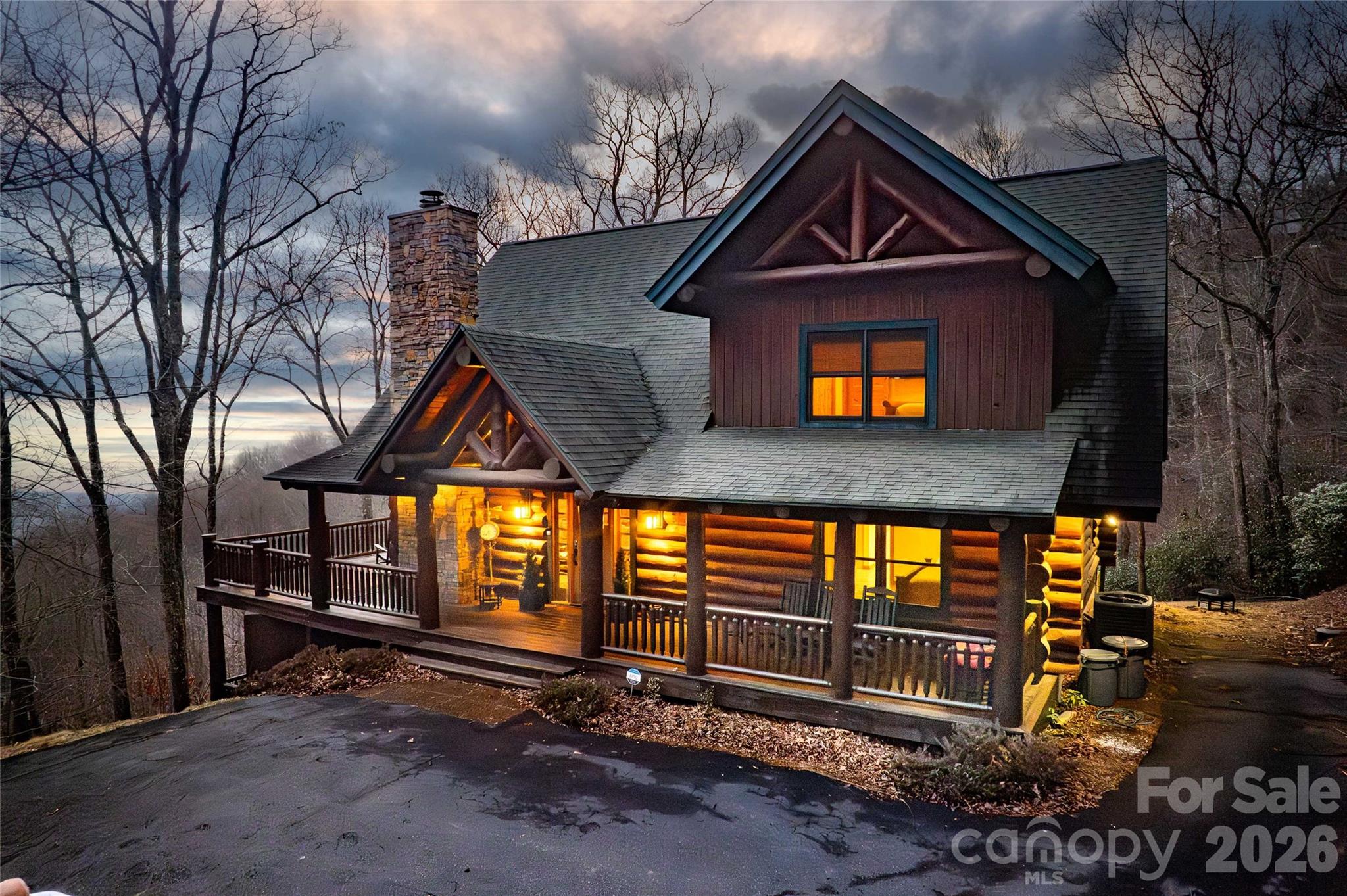 1391 Still Branch Road Sylva, NC 28779 - Photo 5 of 40 a front view of a house with a yard