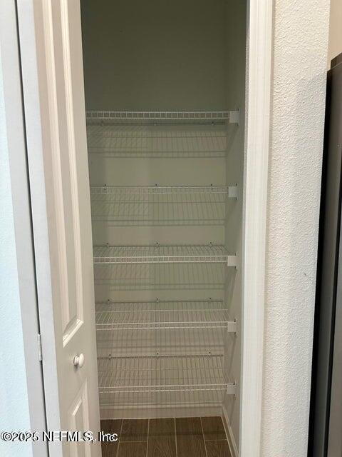 389 Belfort Court St. Augustine, FL 32092 - Photo 11 of 24 a bathroom with a glass door shower