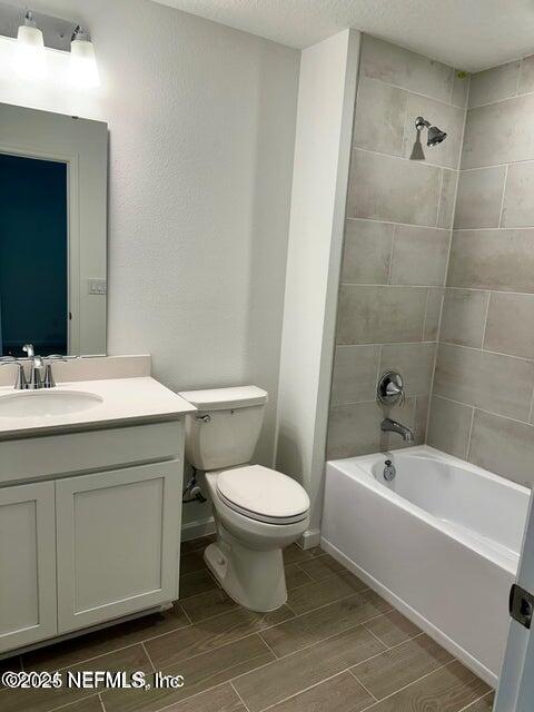 389 Belfort Court St. Augustine, FL 32092 - Photo 14 of 24 a bathroom with a sink a toilet and shower