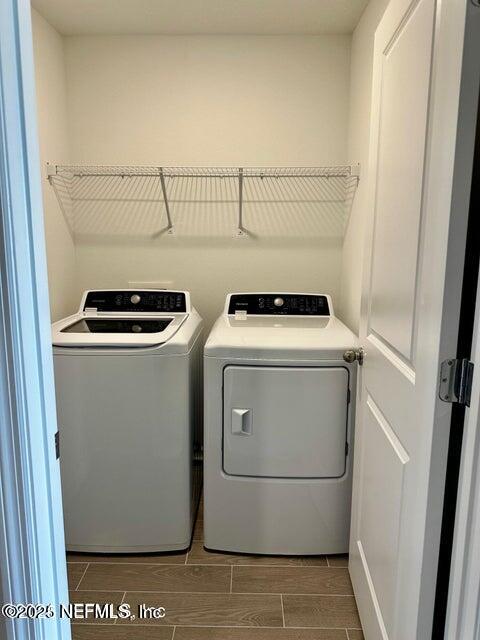 389 Belfort Court St. Augustine, FL 32092 - Photo 15 of 24 a utility room with dryer and washer