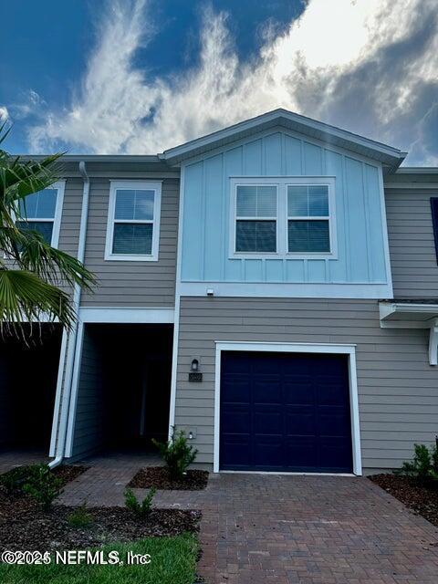 389 Belfort Court St. Augustine, FL 32092 - Photo 2 of 24 a front view of a house with a yard