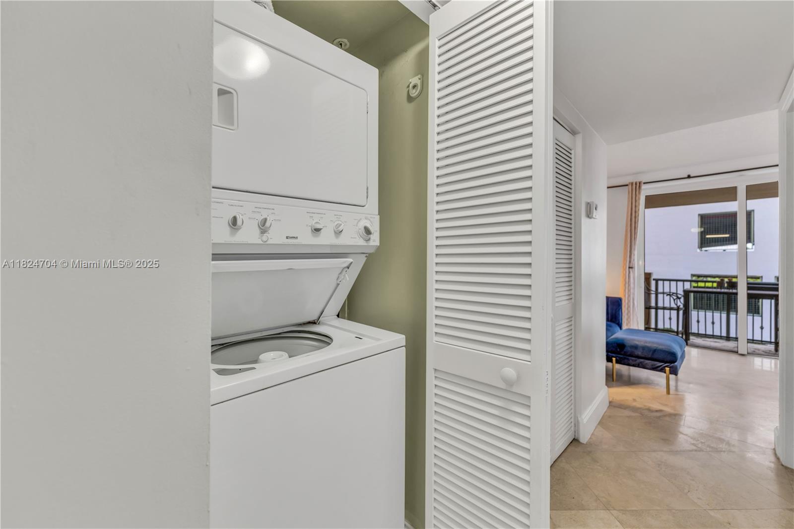 2951 South Bayshore Drive, Unit 717 Miami, FL 33133 - Photo 15 of 31 a view of washer and dryer