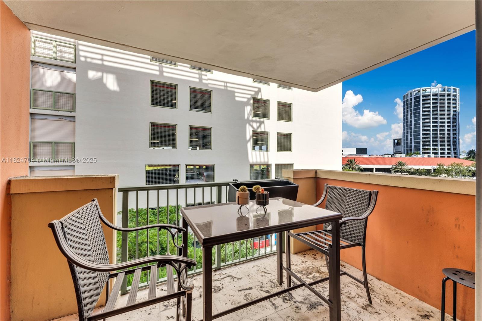 2951 South Bayshore Drive, Unit 717 Miami, FL 33133 - Photo 21 of 31 a outdoor dining space with furniture and outdoor view
