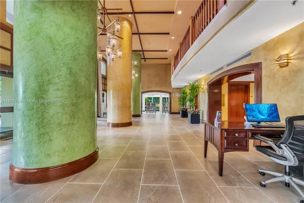 a view of a patio with table and chairs