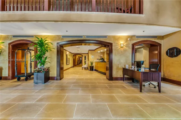 wooden floor in a hall with an entryway