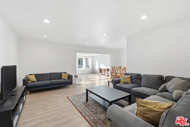 a living room with furniture and a couch