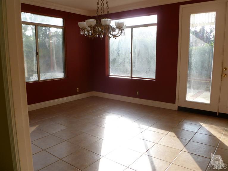 11667 Pinedale Road Moorpark, CA 93021 - Photo 5 of 7 a view of an empty room with a window