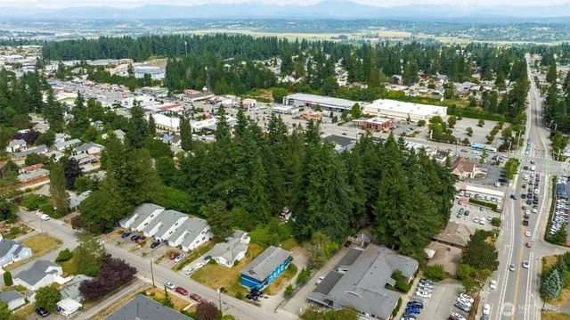 a view of multiple house with yard