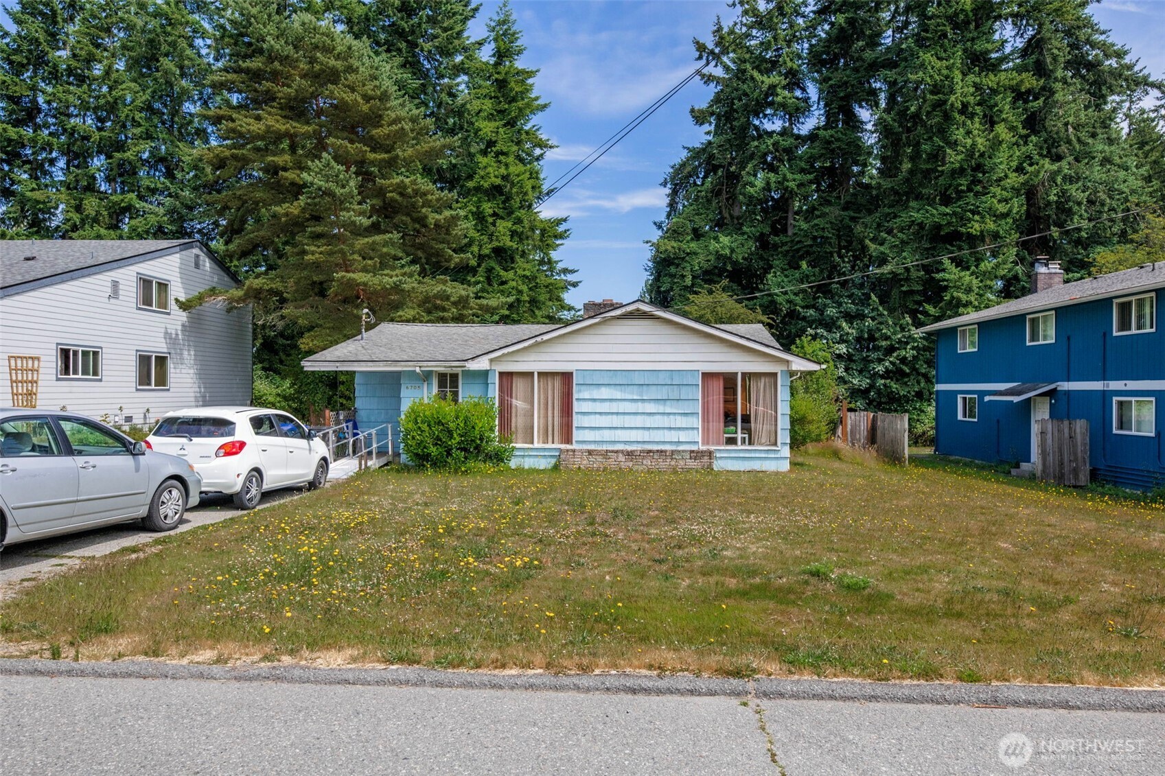 6705 Cady Road Everett, WA 98203 - Photo 5 of 16 a front view of house with yard and trees