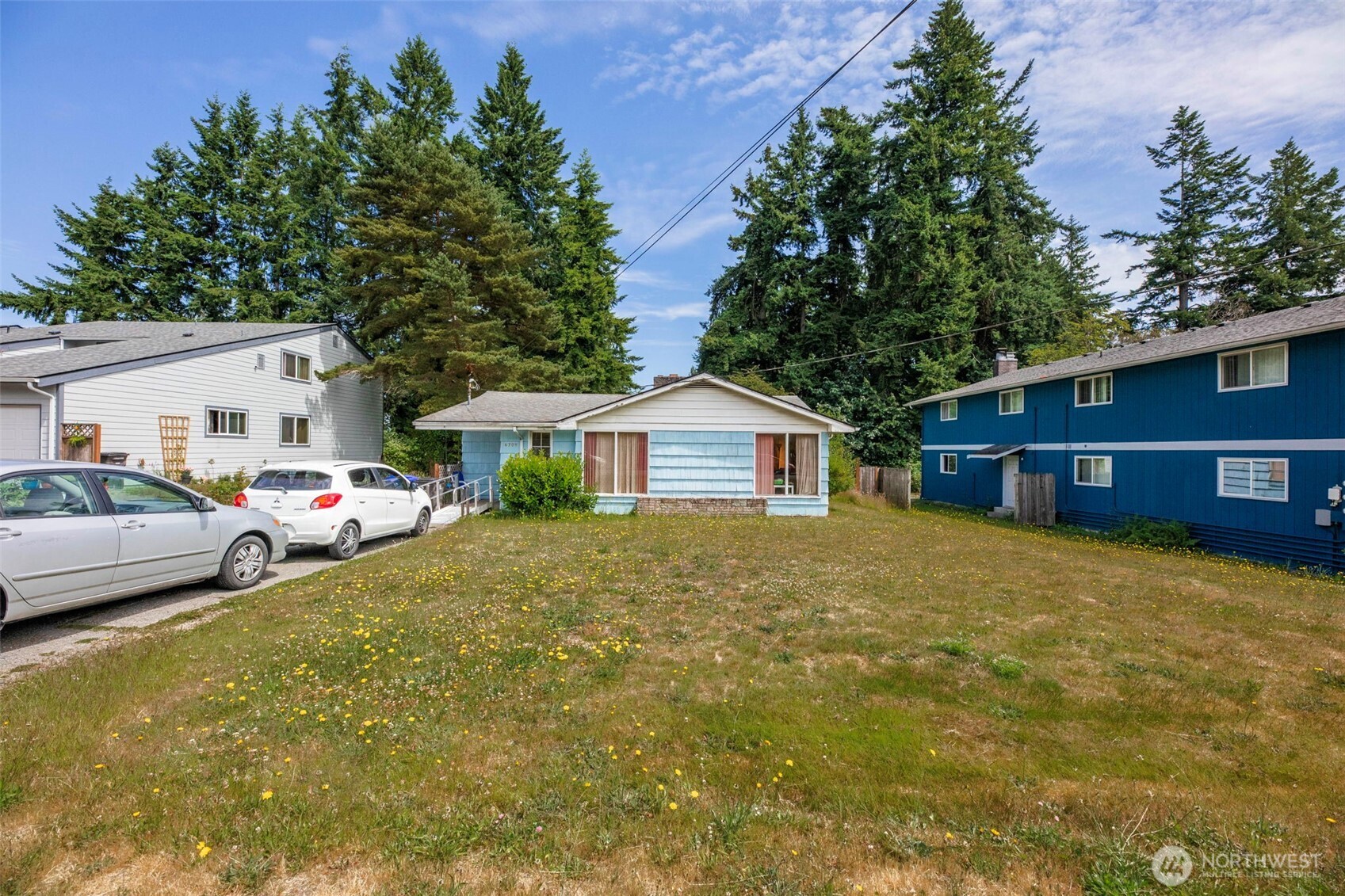 6705 Cady Road Everett, WA 98203 - Photo 6 of 16 a view of a house with backyard and garden