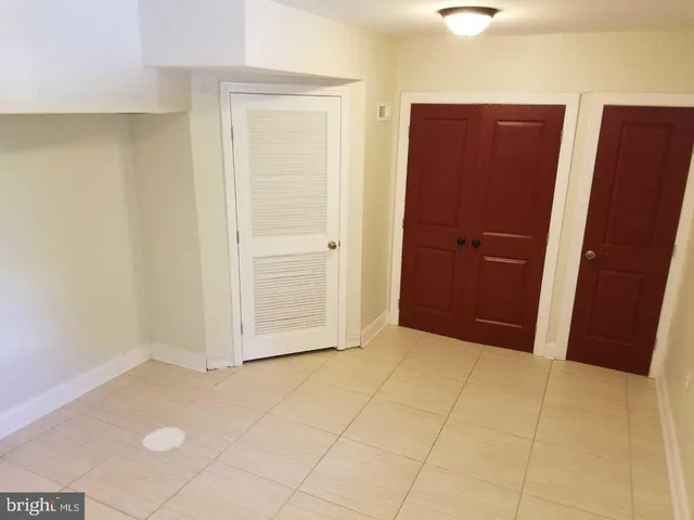 an empty room with closet