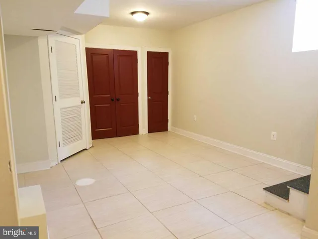 a hallway with washer and dryer