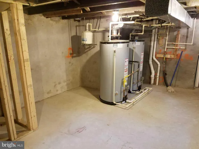 a view of a backyard with sitting area