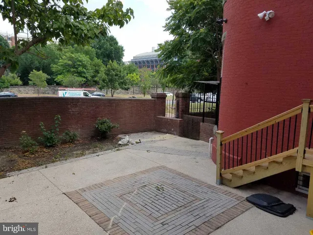 a view of a backyard of the house