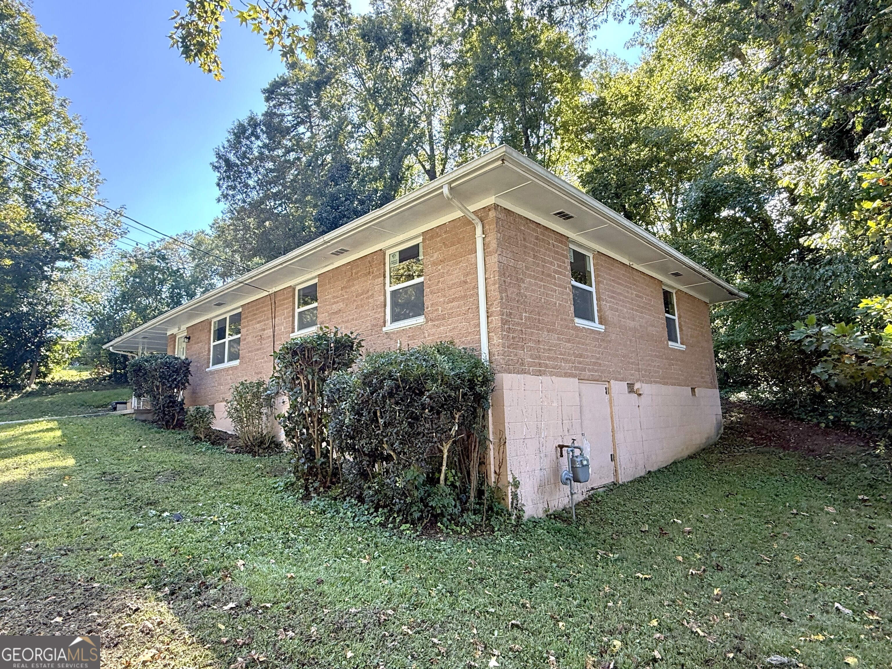 226 Poplar Street Toccoa, GA 30577 - Photo 13 of 17 a view of a house with a yard