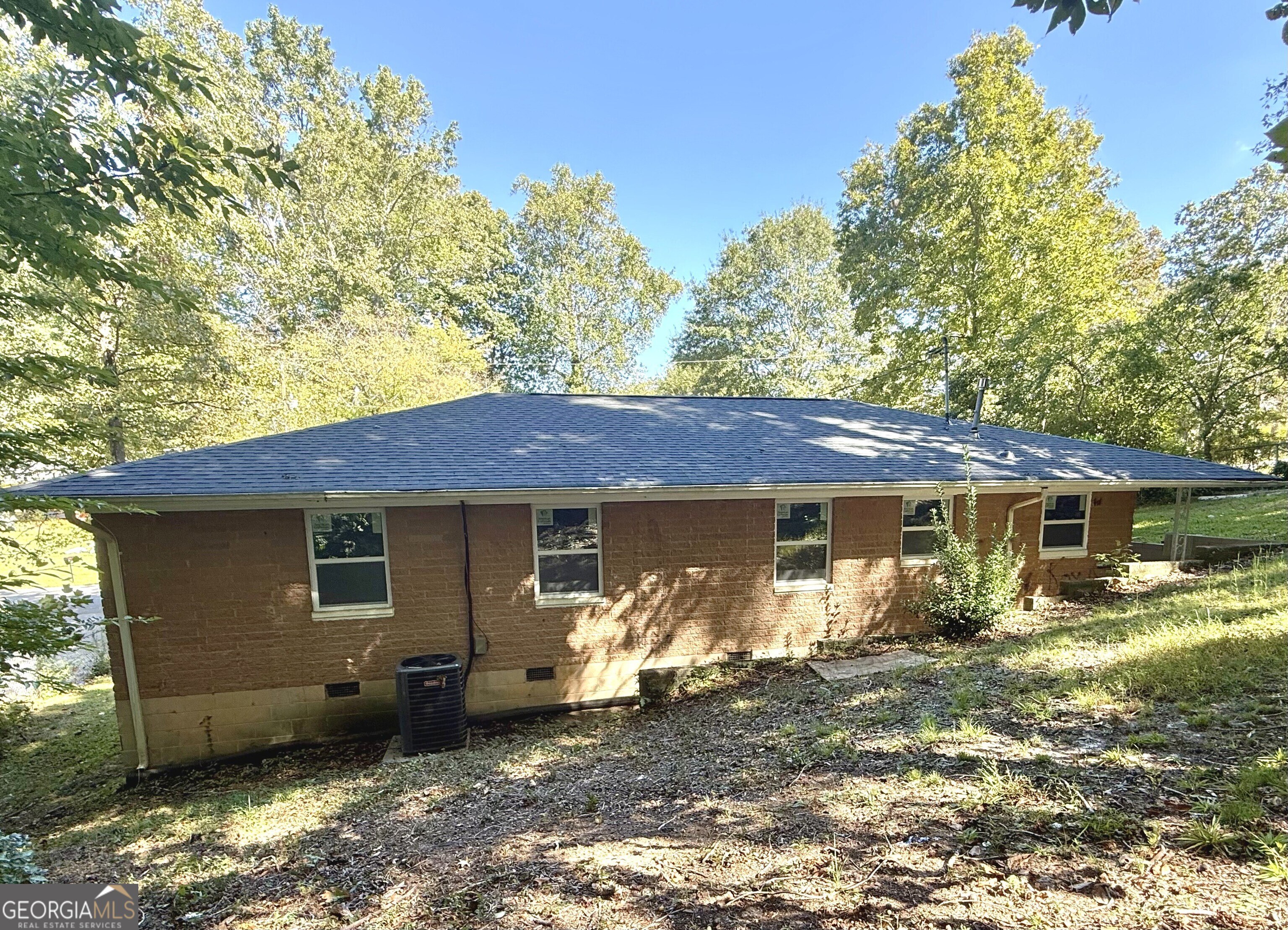 226 Poplar Street Toccoa, GA 30577 - Photo 14 of 17 a view of a house with a yard